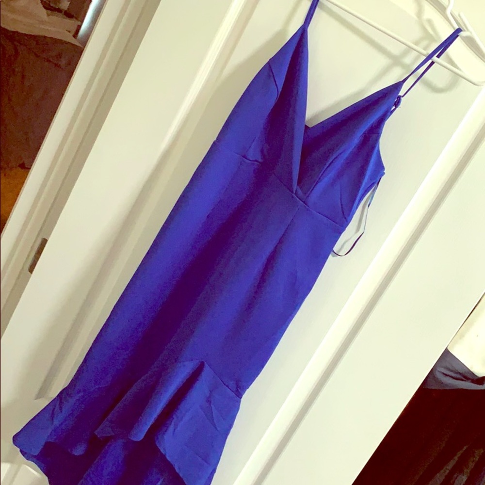 New bright blue dress with asymmetrical hem ruffle
